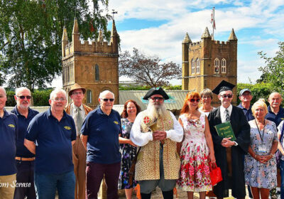 Wimborne town crier Chris Brown with the 70th birthday cry. Photo by Tom Scrase