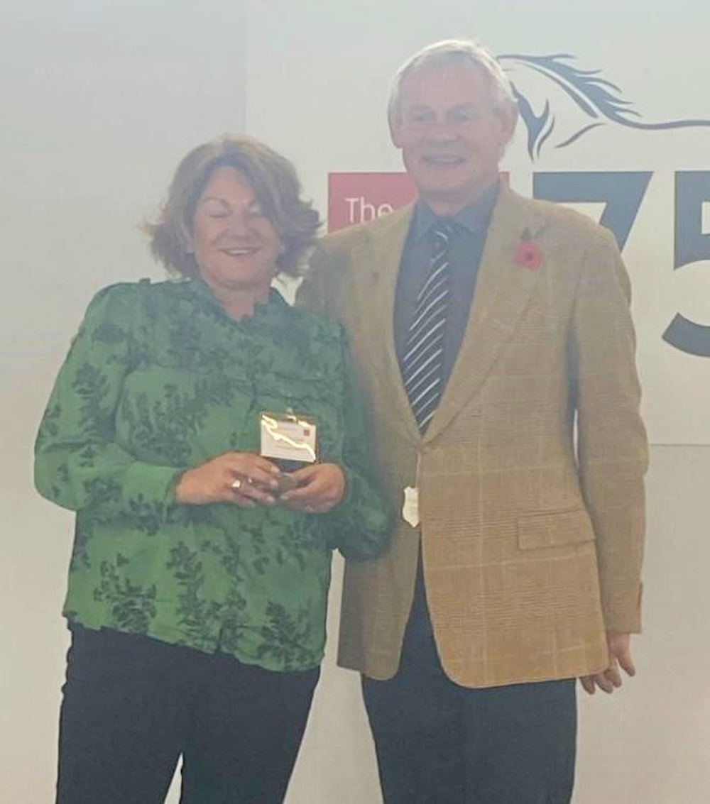 Stephanie with her award and with Martin Clunes Pictures: BHS