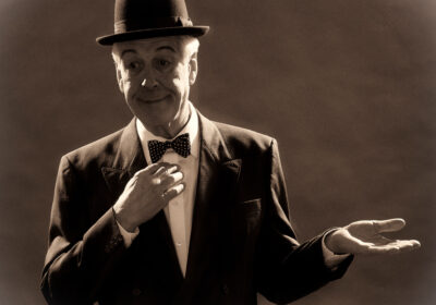 Jeffrey Holland as Stan Laurel