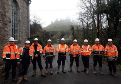 Workers prepare to reopen the road after the work was finished