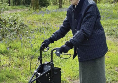 Barbara Rawlin 108, who lives in Wimborne, walking at Pamphill