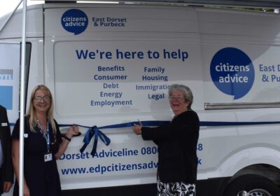 Cllr Chris Moreton, deputy mayor of Swanage; Helen Goldsack, chief officer at Citizens Advice in East Dorset & Purbeck and Cllr Tina Foster, mayor of Swanage, open the new advice bus