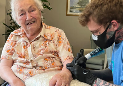 Nathan works on Hilda's new tattoo