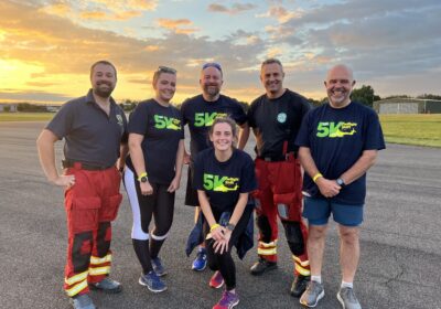Air ambulance crew members with participants at last year's 5K Twilight Shift