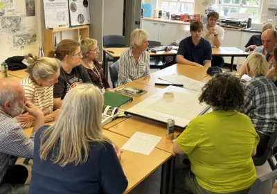 Students from Kingston Maurward College with staff from Dorset County Hospital discussing plans for the sensory garden