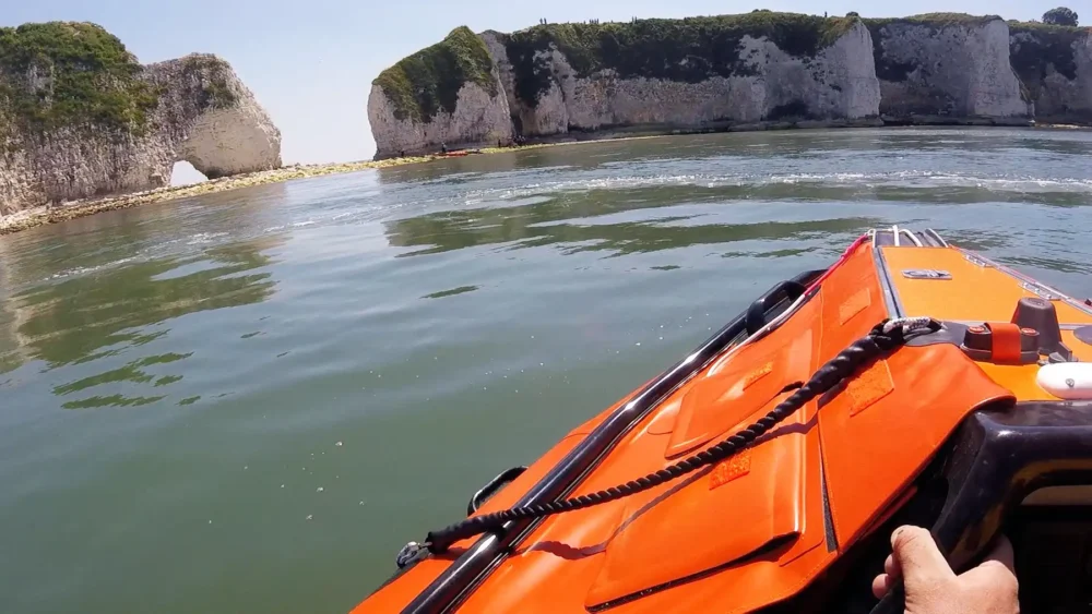 The crew scrambled to rescue the teen after he fell from the Old Harry Rocks. Pictures: RNLI