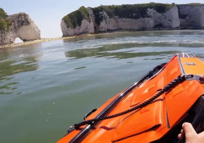 The crew scrambled to rescue the teen after he fell from the Old Harry Rocks. Pictures: RNLI