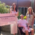 Danny Fudge-Harman from Danny's MND Foundation presenting a cheque to Forest Holme Hospice Charity CEO Hannah O' Hare Picture: Danny's MND