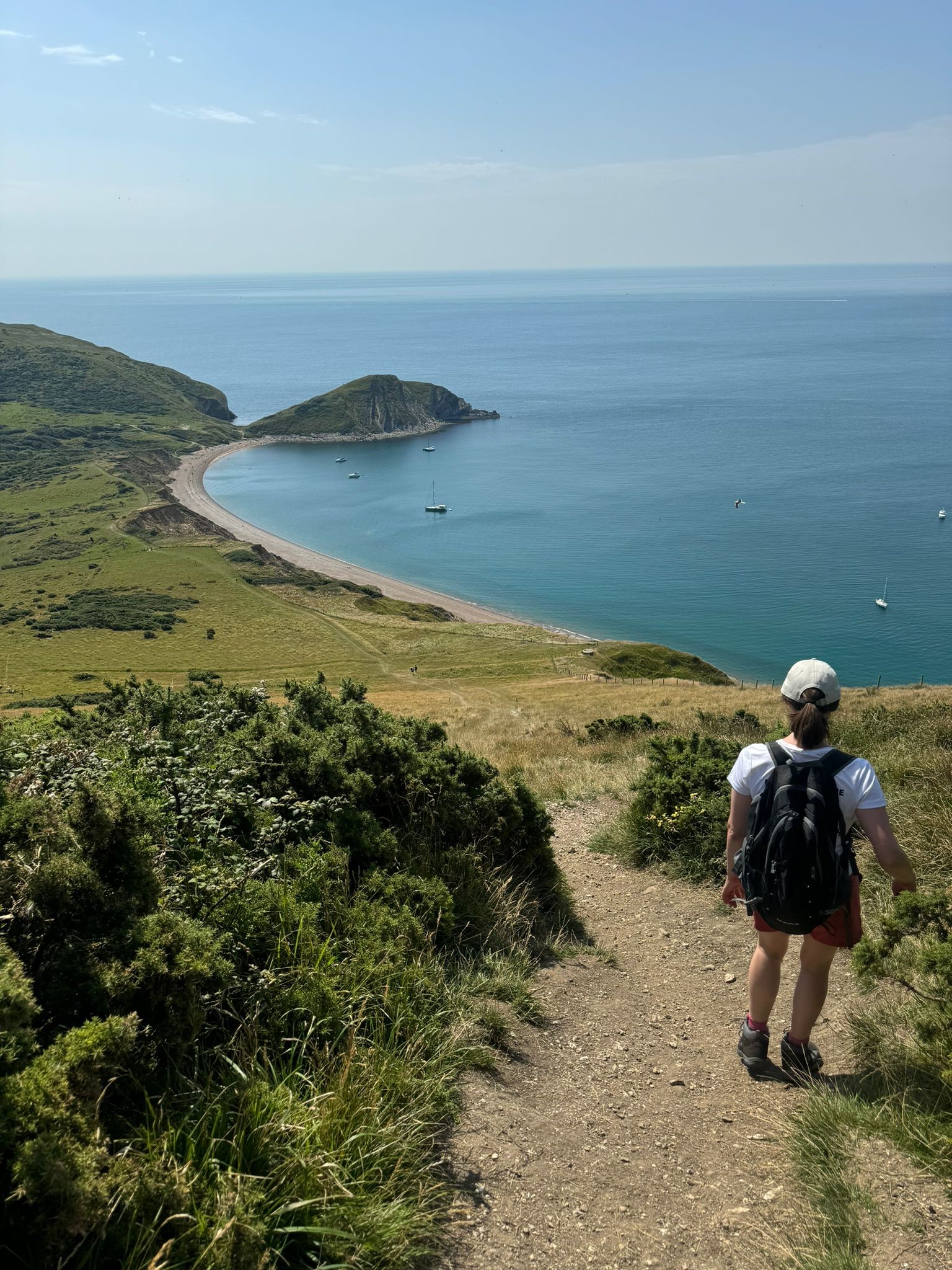 One of McCarthy Stone's team walking along part of the Jurassic coastline Picture: McCarthy Stone