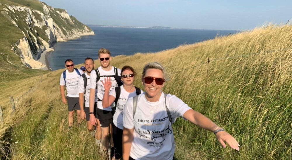 Some of McCarthy Stones team walking the Jurassic coastline to raise money for charity Picture: McCarthy Stone