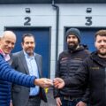 Cllr Richard Biggs hands over the keys to Liam Botting, managing director and Anthony Culshaw, technical director at Britlif, joined by Justin Ives, managing director, Spetisbury Construction who built the units Picture: Dorset Council