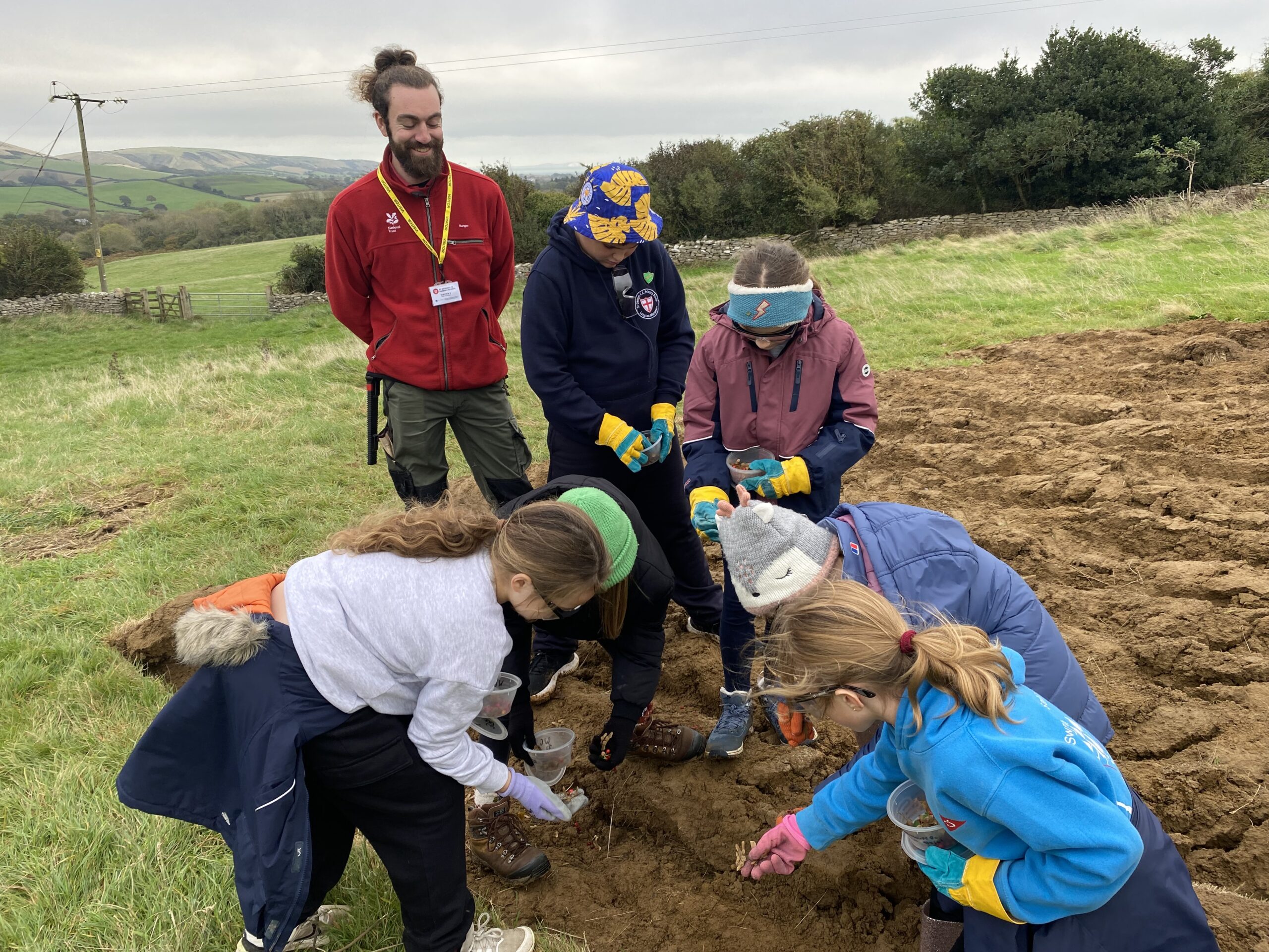 Pupils at St George's School taking part in seed planting Picture: National Trust