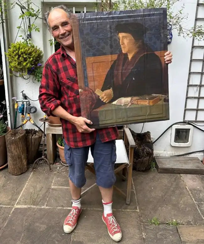 Actor Mark Rylance with the portrait from Wolf Hall that will be auctioned. Picture: Planet Purbeck