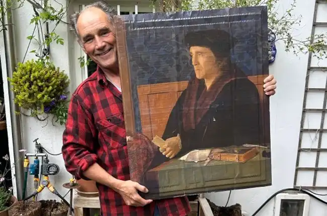 Actor Mark Rylance with the portrait from Wolf Hall that will be auctioned. Picture: Planet Purbeck